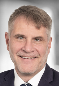 Abgebildet ist Prof. Dr. med. Steffen Gramminger, Geschäftsführer der Hessischen Krankenhausgesellschaft e.V.