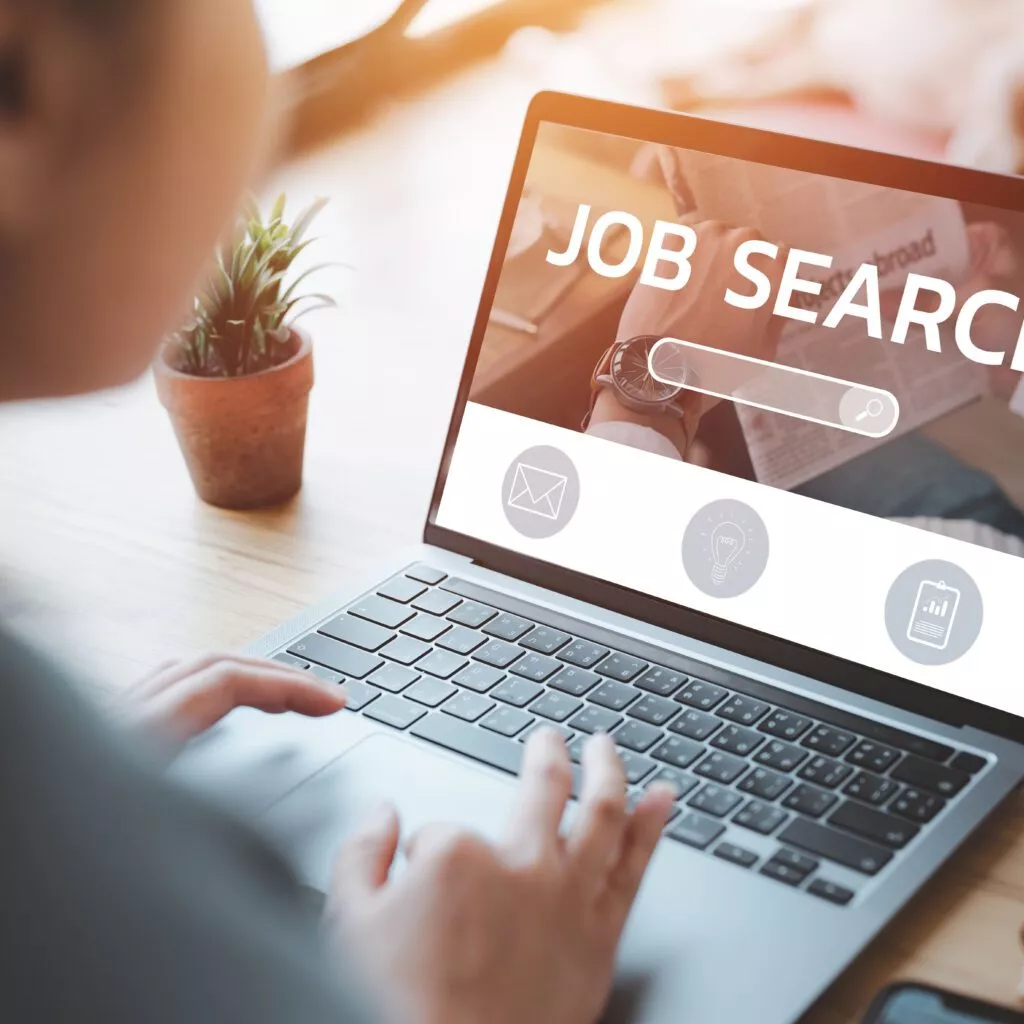 woman using laptop for job search concept, find your career, woman looking at online website